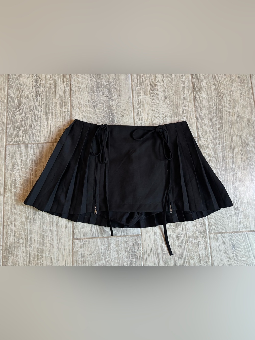 Black Pleated Mini Skirt with Drawstring Detail